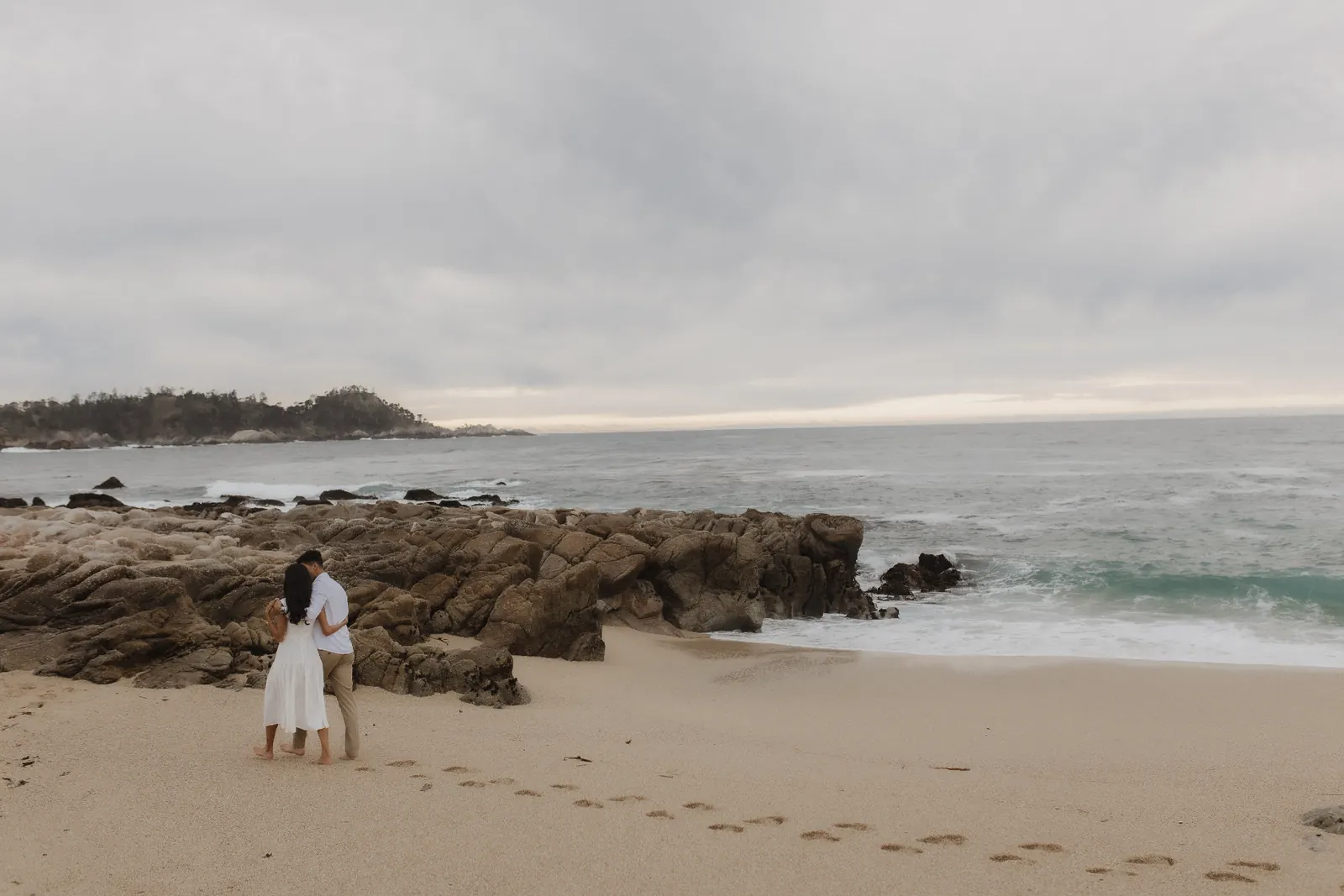 Anish and Divya on a Carmel beach at sunset — engagement photo